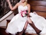 a strapless wedding ballgown of lace with brown cowboy boots for a rustic barn wedding