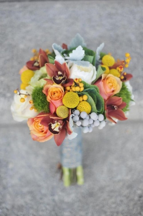 a catchy fall wedding bouquet of pink, white and dusty pink blooms, billy balls and various berries, greenery and even moss is a fun idea for the fall