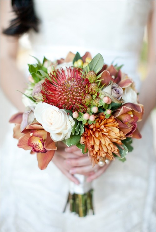 a bright wedding bouquet of pink, rust and white blooms, greenery and berries is a lovely idea for a simple fall wedding