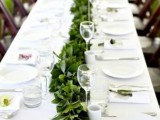 a simple greenery table runner will refresh your neutral tablescape, even if you have an all-white wedding, it will fit