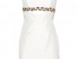 a modern fitting one shoulder mini dress with shiny rhinestones on the bodice is a chic and sexy idea for a bride-to-be