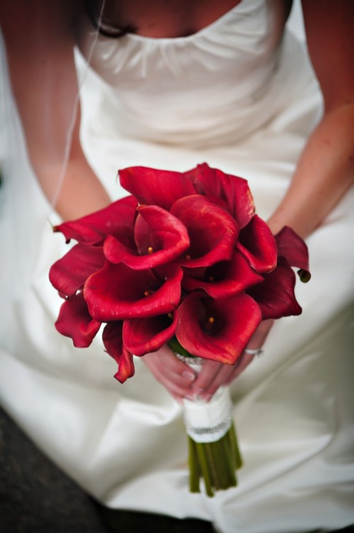 a red calla wedding bouquet is traditional elegance and chic that will fit not only a Valentine bride but also any other