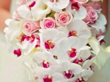 a light pink rose, white callas and white and pink orchid cascading wedding bouquet is pure luxury and beauty for Valentine’s Day