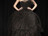 a unique black embellished strapless wedding dress with black sheer petals all over the dress is a very unusual solution
