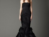 a strapless mermaid wedding dress with a ruffle tail with a train is a very stylish solution for a modern wedding