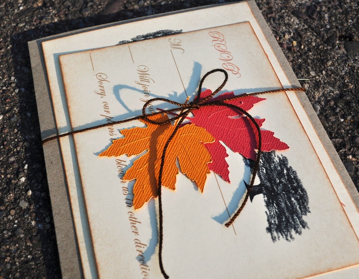 A chic and bright wedding invitation suite with bold fall leaves and a painted tree