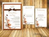 a vintage-inspired fall leaf wedding invitation suite with bright fal leaves and plants printed on it