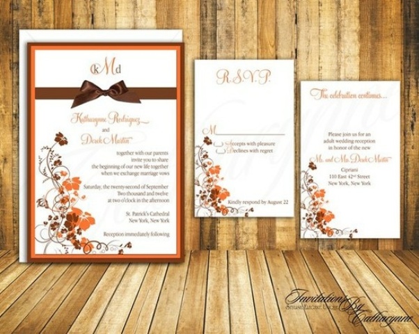 A vintage inspired fall leaf wedding invitation suite with bright fal leaves and plants printed on it
