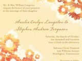 a neutral wedding invitation with bright and bold fall flowers printed on it