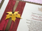 a chic wedding invitation suite done in burgundy, brown and with a tiny fall leaf