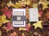a chic wedding invitation suite in purple, chocolate brown and red plus kraft paper