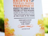 a bright fall wedding invitation with colorful letters and bold orange leaves printed on it
