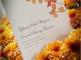 a chic fall wedding invitation with bright fall leaves printed is a cool idea for a fall wedding