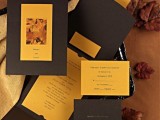 a fall colored wedding invitation suite in deep brown and yellow plus some leaf patterns