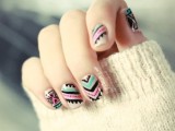 black, white, turquoise and pink wedding nails with boho and tribal patterns are a very cool and bold idea to rock