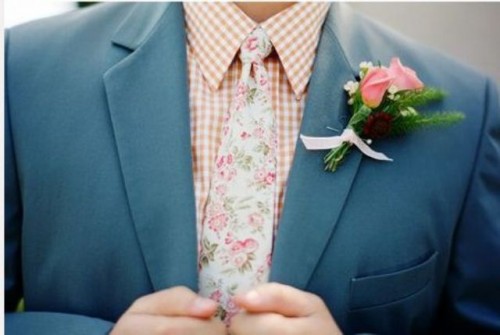 go whimsy with a grey suit, a tan plaid shirt, a floral tie and a matching floral boutonniere