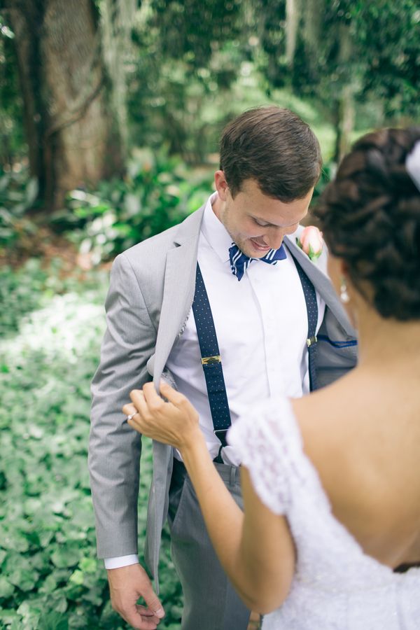 A stylish groom's look with a retro feel added with suspenders and a printed bow tie