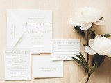neutral minimalist wedding invitations with calligraphy are a stylish idea for a minimal wedding