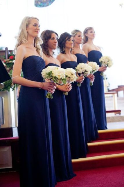 strapless navy maxi bridesmaid dresses and white bouquets for bold and chic bridesmaid looks