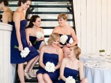 strapless navy A-line bridesmaid dresses and white bouquets for a bold nautical wedding