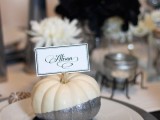 a cool white and silver glitter pumpkin as a wedding favor and a card holder at the same time is a lovely piece that you can DIY