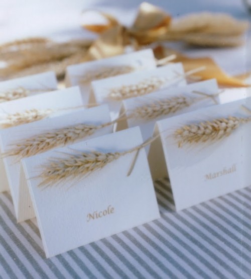 white cards decorated with wheat are amazing for a fall or Thanksgiving wedding and you can DIY them easily