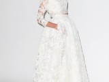 a chic and beautiful lace bridal separate with a crop top with a high neckline, long sleeves and a high low skirt with a train plus blue shoes