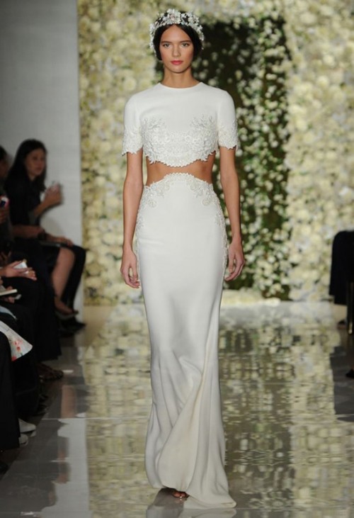a whimsical modern bridal separate with an embellshed crop top, short sleeves and a high neckline and a fitting skirt with a train