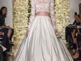 a luxurious bridal separate with a lace crop top with long sleeves and a full plain skirt with subtle pleating for a royal-like look