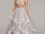 a glam bridal separate with a textural and applique crop top and a full layered skirt with a catchy edge is gorgeous