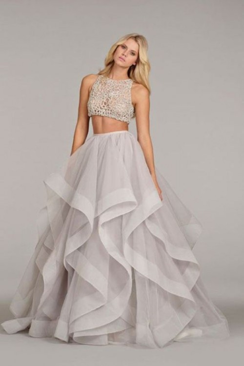 a glam bridal separate with a textural and applique crop top and a full layered skirt with a catchy edge is gorgeous