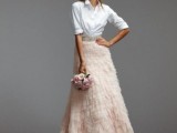 a modern bridal separate with a white shirt and a blush ruffle A-line maxi skirt is a very modern and bold idea