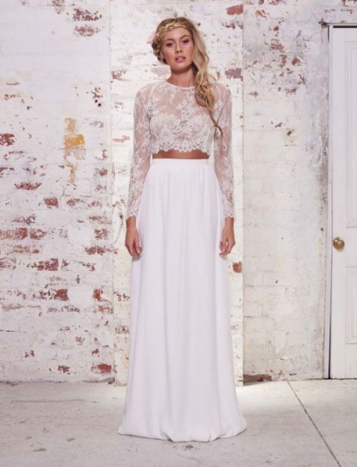a white lace crop top with long sleeves and a plain maxi skirt for a chic and very romantic bridal look