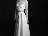 a sexy lace bridal separate with a crop top and long sleeves plus an illusion neckline and an A-line high low skirt with a train