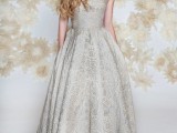 a luxurious grey lace strapless A-line high low wedding dress plus nude shoes for a bride who doesn’t want any whites