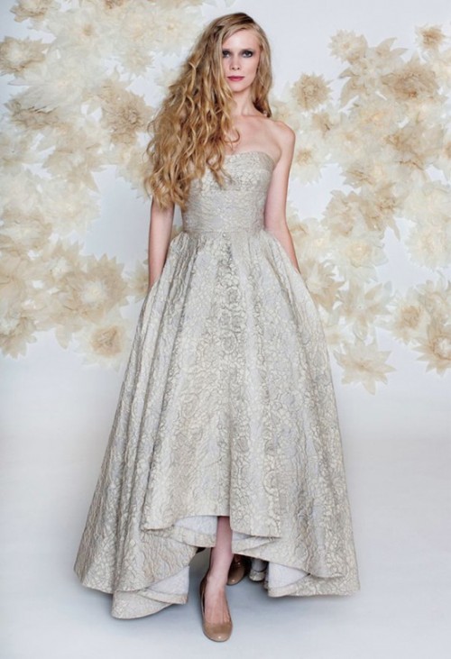 a luxurious grey lace strapless A-line high low wedding dress plus nude shoes for a bride who doesn't want any whites