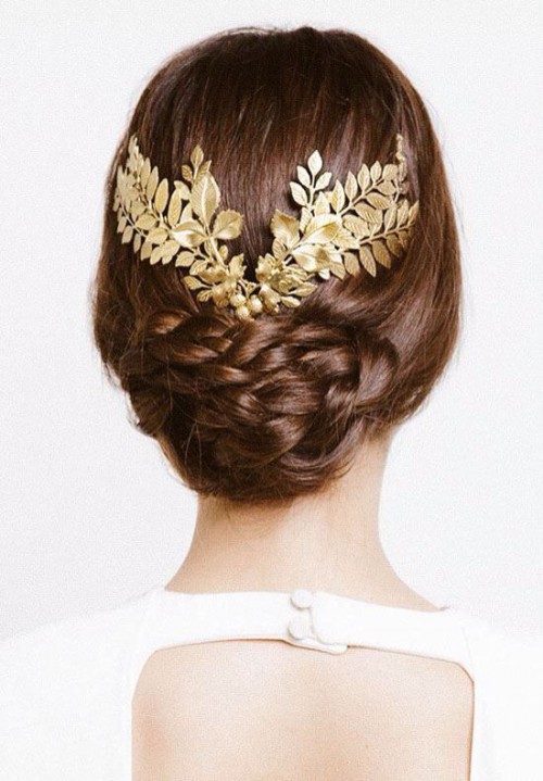 a gold leaf headpiece with berries is a cic and stylish accessory with a touch of shine, that is ideal for a low updo