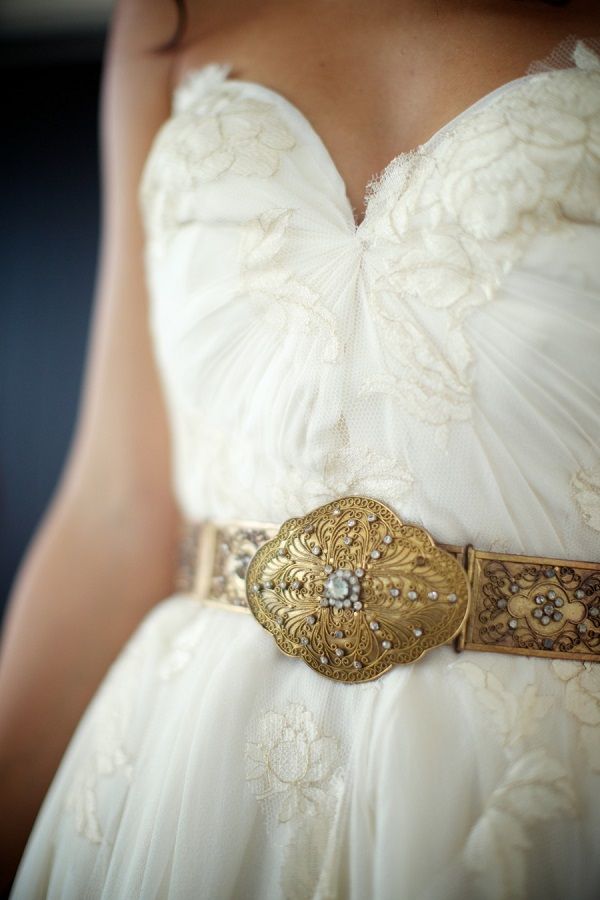 A beautiful vintage inspired gold bridal belt with crystals is a lovely idea to accent your neutral wedding dress