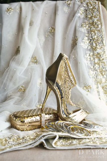 gold ankle strap wedding shoes and a gold clutch are a perfect solution for a glam bride who wants to add a bling to her outfit