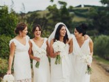 mismatching white V-neckline bridesmaid dresses will let each girl show off her personal style