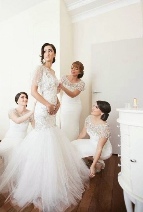 elegant and chic white maxi bridesmaid dresses with heavily embellished shoulders are amazing for a vintage chic wedding