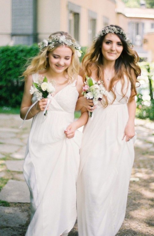 matching white A-line bridesmaid dresses with empire waist, with V-necklines and straps are amazing for a spring or summer wedding