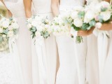 mismatching white fitting maxi bridesmaid dresses are lovely for an elegant spring or summer wedding in neutrals