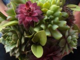 a succulent wedding bouquet that presents only succulents of various shades looks amazing and very modern