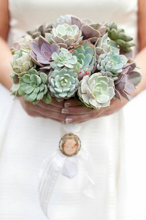 a full succulent wedding bouquet of green and dark ones is a catchy and lovely idea for a wedding, it will give much interest to your look