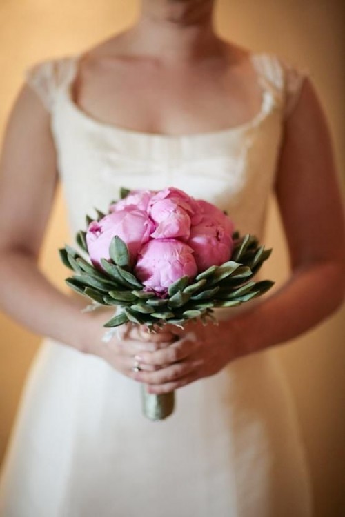 a pink peony and succulent wedding bouquet is a bold and catchy idea for spring and summer brides