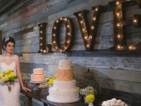 a reclaimed wooden wall and marquee letters are a match made in heaven, use marquee letters if you have such a venue