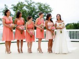 mismatching coral pink knee dresses for the gals and a blush strapless gown for the maid of honor