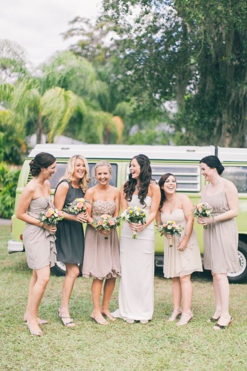 mismatching nude toned short bridesmaid dresses and a graphite grey short dress for the maid of honor