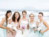 matching embellished mint green gowns for the bridesmaids and a blush embellished dress for the maid of honor